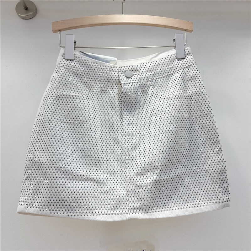 FALDA JEANS CON BRILLO te